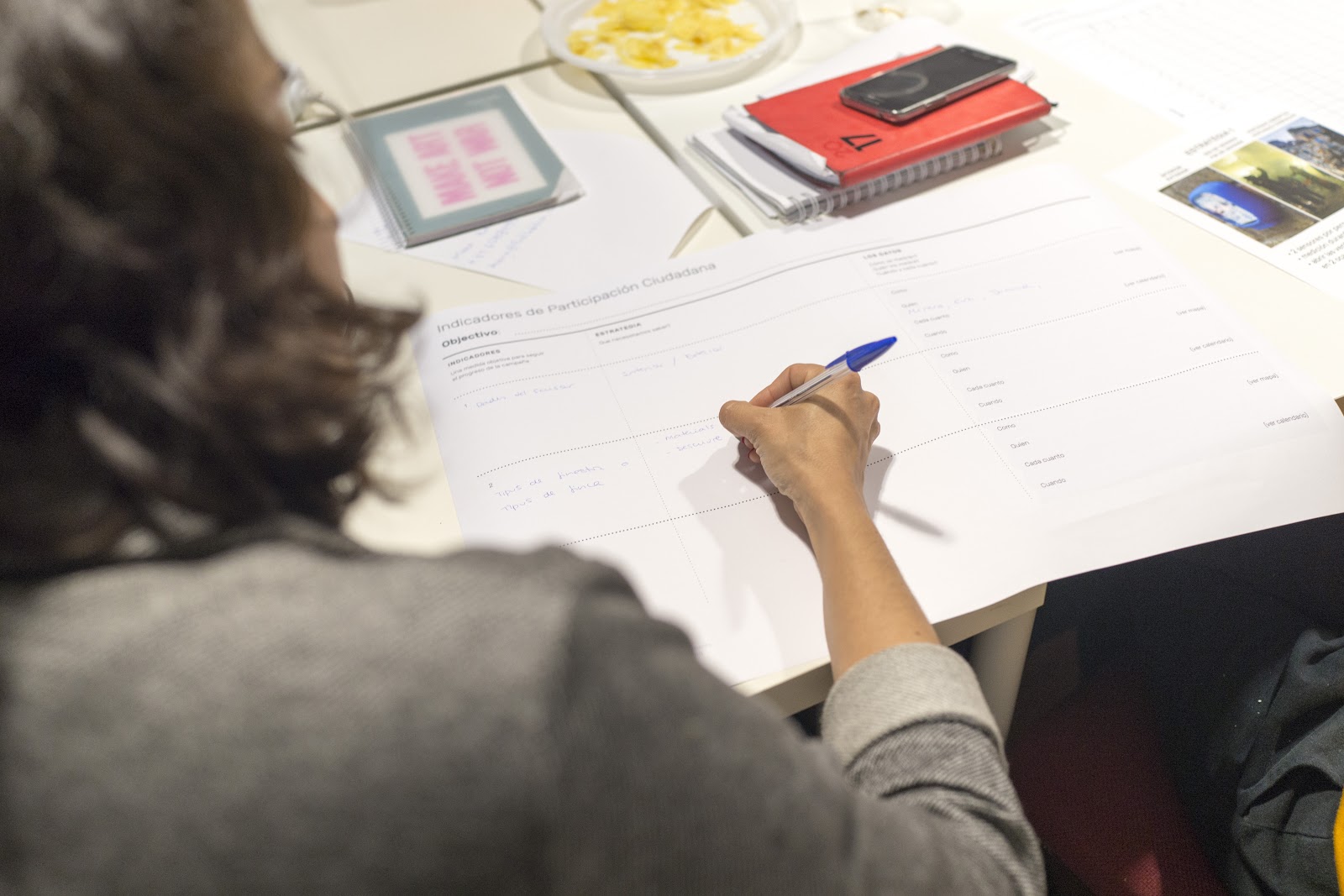 A woman filling in a form