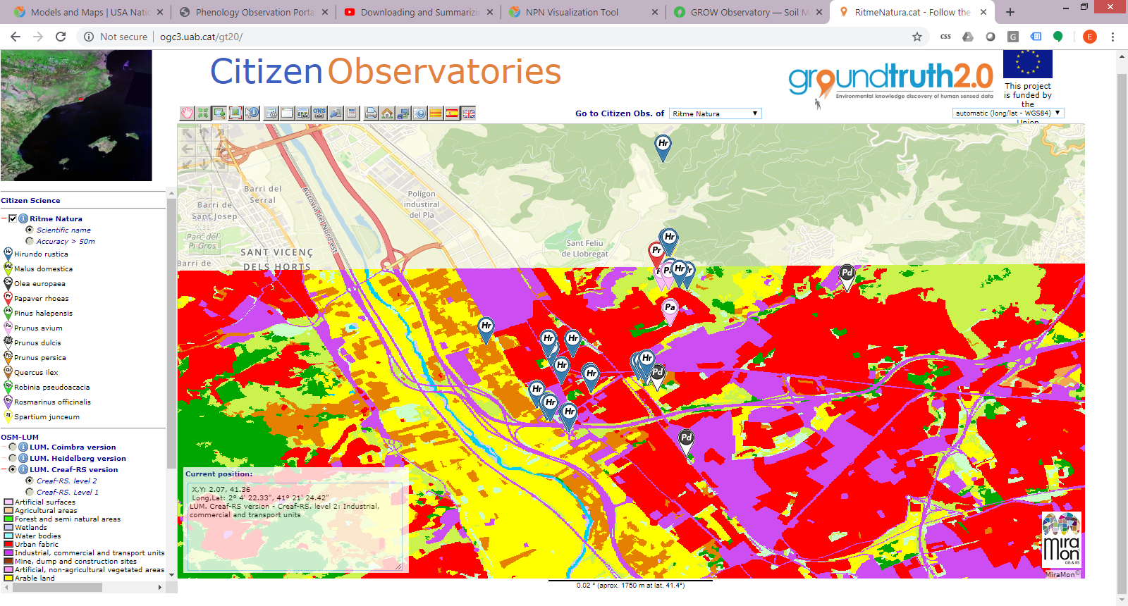 A screenshot of a Citizen Observatories map. The top of it is ordinary map colours, e.g. yellow and orange for roads and green for unbuilt areas, while the bottom is more lurid reds and yellows, because it has been coloured according to keys such as "arable land".