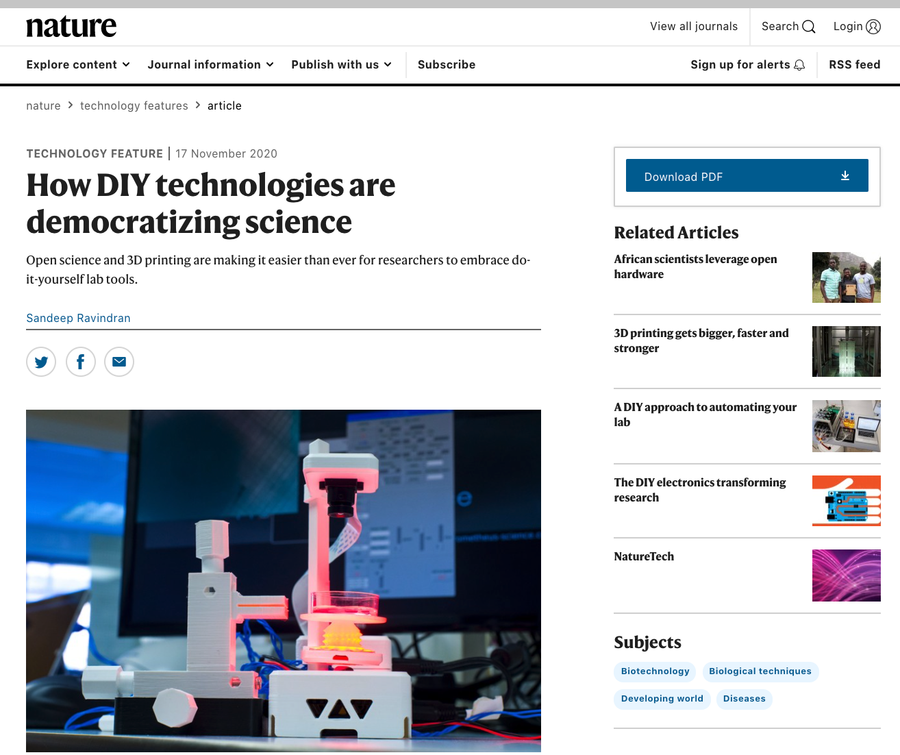 The images is a website screenshot depicting a microscope in a very colourful environment